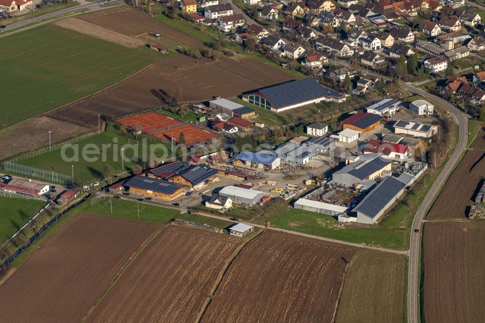 Aerial photograph Ettenheim - Industrial estate and company settlement and Sportplatz Ortsteil Muenchweier in Ettenheim in the state Baden-Wurttemberg, Germany