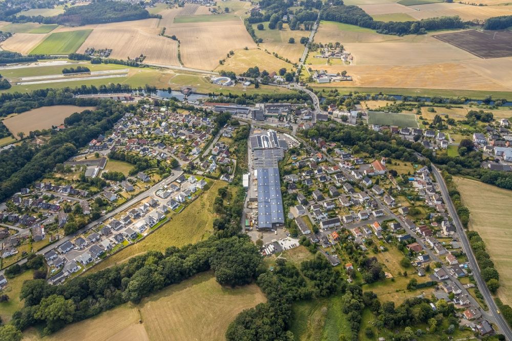 Aerial image Fröndenberg/Ruhr - Mixed development of commercial units and company branches in the residential area of a single-family housing estate on Ardeyer Strasse in the district Langschede in Froendenberg/Ruhr in the state North Rhine-Westphalia, Germany