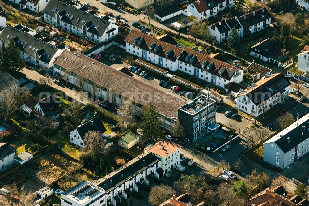 Aerial image Germering - Mixed development of commercial units and company branches in the residential area of a single-family housing estate Friedenstrasse - Riestrasse in the district Unterpfaffenhofen in Germering in the state Bavaria, Germany