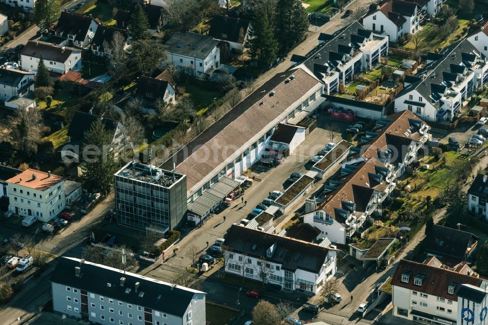 Germering from above - Mixed development of commercial units and company branches in the residential area of a single-family housing estate Friedenstrasse - Riestrasse in the district Unterpfaffenhofen in Germering in the state Bavaria, Germany