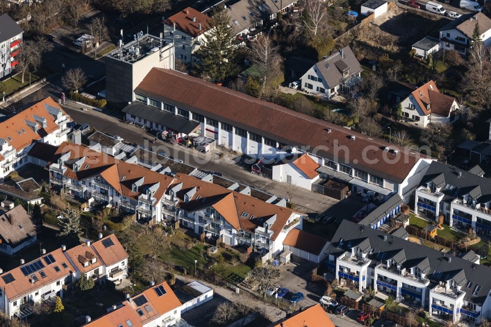 Germering from above - Mixed development of commercial units and company branches in the residential area of a single-family housing estate Friedenstrasse - Riestrasse in the district Unterpfaffenhofen in Germering in the state Bavaria, Germany