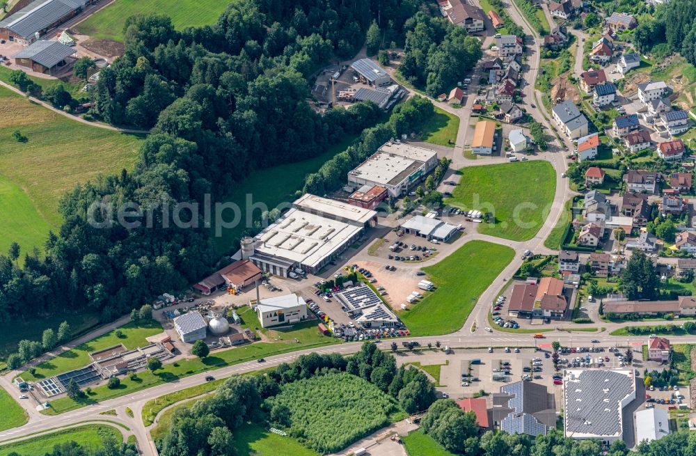 Elzach from the bird's eye view: Mixed development of commercial units and company branches in the residential area of a single-family housing estate Im Suedwesten von Elzach in Elztal in Elzach in the state Baden-Wuerttemberg, Germany