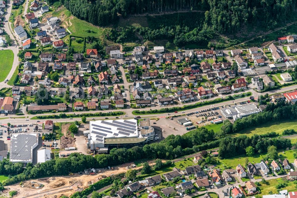 Aerial image Elzach - Mixed development of commercial units and company branches in the residential area of a single-family housing estate Im Suedwesten von Elzach in Elztal in Elzach in the state Baden-Wuerttemberg, Germany