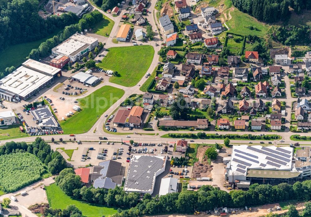 Aerial photograph Elzach - Mixed development of commercial units and company branches in the residential area of a single-family housing estate Im Suedwesten von Elzach in Elztal in Elzach in the state Baden-Wuerttemberg, Germany