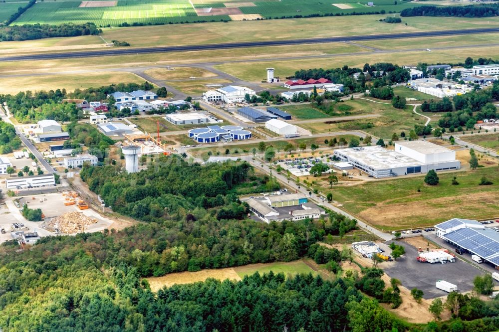 Eschbach from the bird's eye view: Breisgau Business Park in Eschbach in the state of Baden-Wuerttemberg and the runway of the airfield Bremgarten
