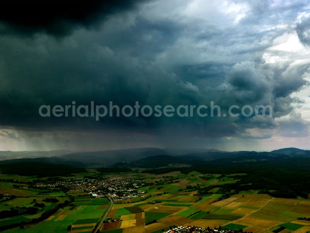 Aerial photograph Dieburg - Storm weather with rain / showers and strong development of cumulus clouds in Dieburg in Hesse