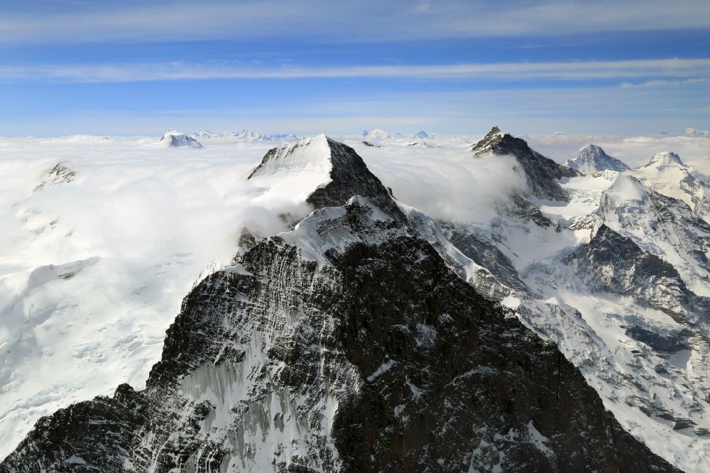 Grindelwald from the bird's eye view: Summits and mountain landscape of Eiger, Moench and Jungfrau in Grindelwald in Bern, Switzerland