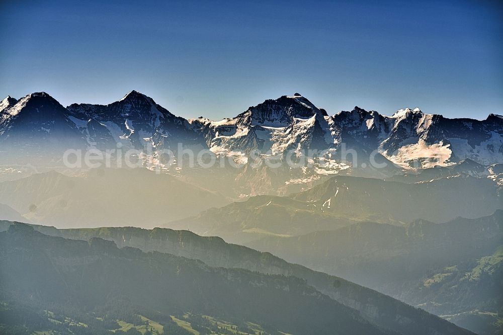 Grindelwald from the bird's eye view: Summits and mountain landscape of Eiger, Moench and Jungfrau in Grindelwald in Bern, Switzerland