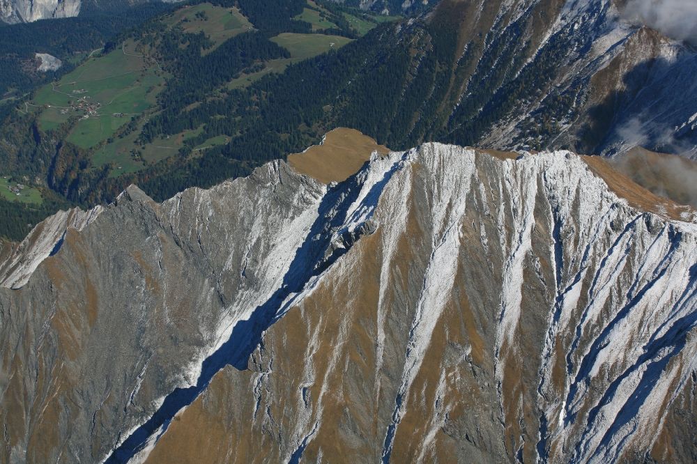 Riein from above - Rocky and mountainous landscape with summit of Piz Riein in the Swiss Alps in Riein in the canton Grisons, Switzerland