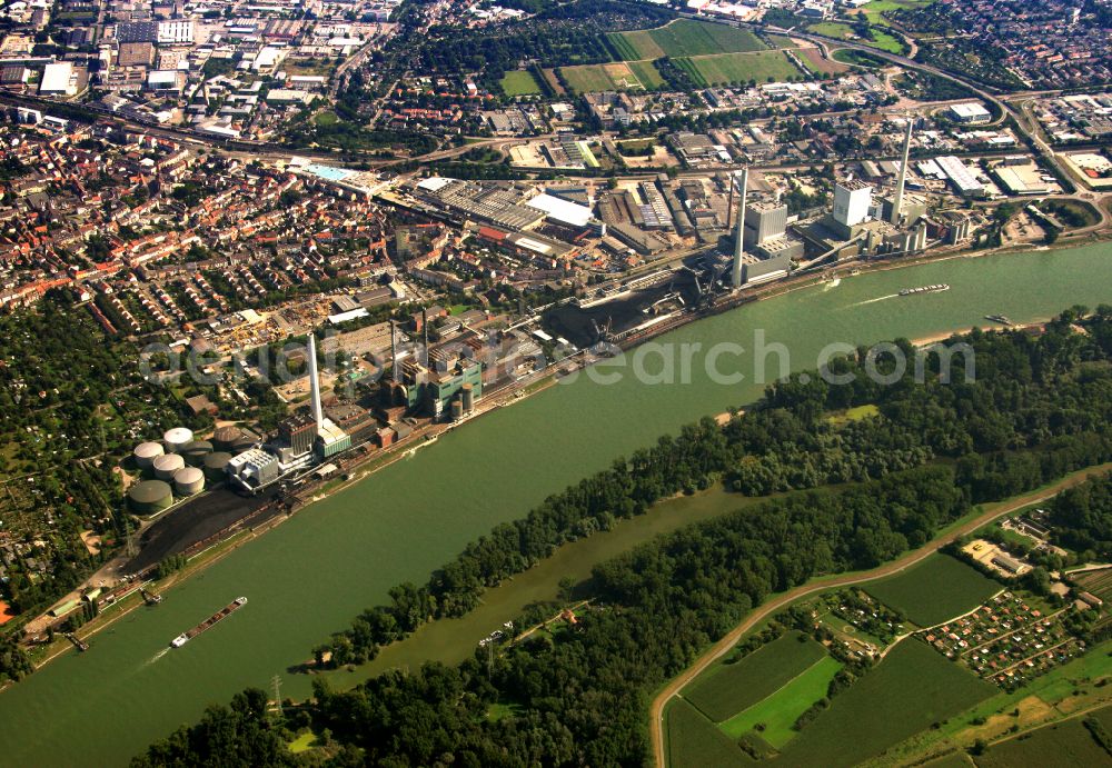 Mannheim from the bird's eye view: Power plants and exhaust towers of coal thermal power station Grosskraftwerk Mannheim AG at the shore of the Rhine river near Neckarau on street Plinaustrasse in Mannheim in the state Baden-Wurttemberg, Germany