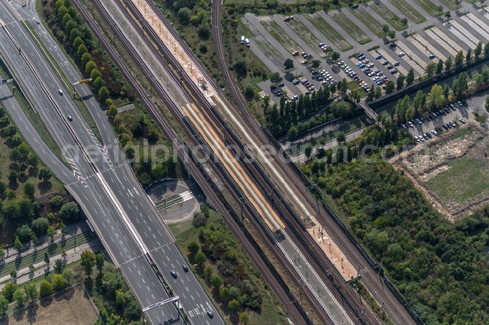 Aerial photograph Leipzig - Railway track and station building of the Deutsche Bahn at the station Leipzig, Messe in Leipzig in the federal state of Saxony, Germany