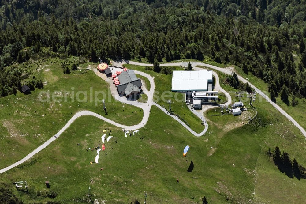 Aerial image Kössen - Paraglider taking off at the Unterberghorn launch site in Koessen in Tyrol, Austria