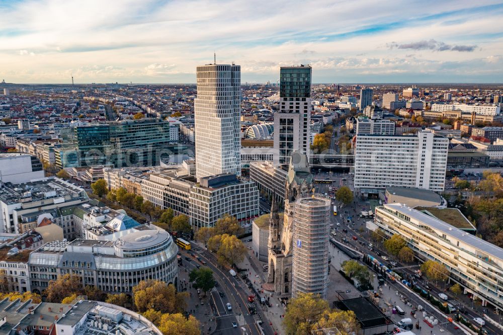 Aerial image Berlin - The Protestant Kaiser William Memorial Church (colloquially known Memorial Church and in Berlin dialect called Hollow Tooth) is located at Breitscheidplatz between the Kurfuerstendamm, the Tauentzienstrasse and the Budapest street in Berlin's Charlottenburg district