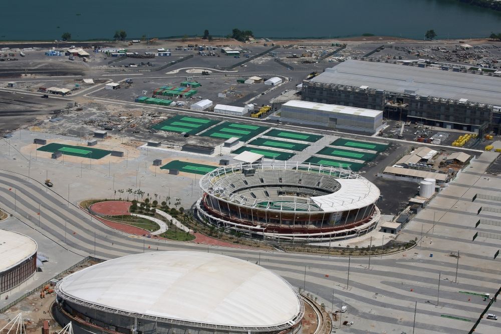 Aerial image Rio de Janeiro - Green colored tennis sports complex inside the Olympic Tennis Centre at the Olympic Park before the summer playing games of XXII. Olympics in Rio de Janeiro in Rio de Janeiro, Brazil