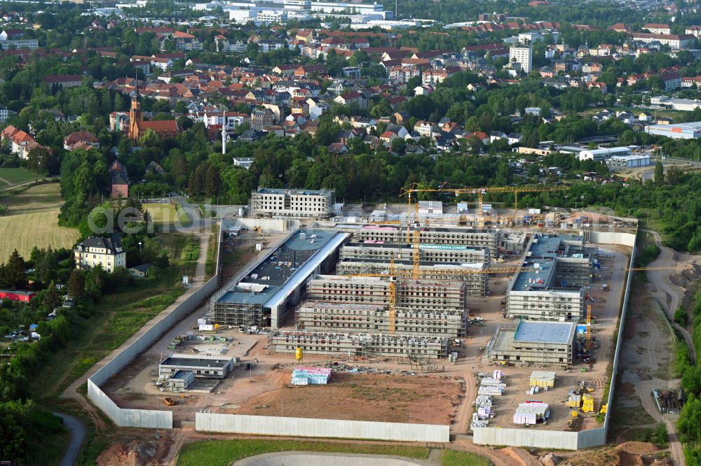 Aerial image Zwickau - Construction site for the new construction of the large prison area and security fencing of the future correctional facility JVA on street Buelaustrasse in the district Marienthal in Zwickau in the state Saxony, Germany
