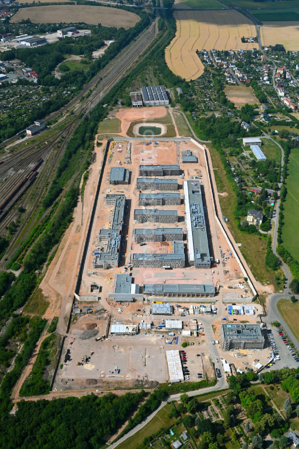 Aerial photograph Zwickau - Construction site for the new construction of the large prison area and security fencing of the future correctional facility JVA on street Buelaustrasse in the district Marienthal in Zwickau in the state Saxony, Germany