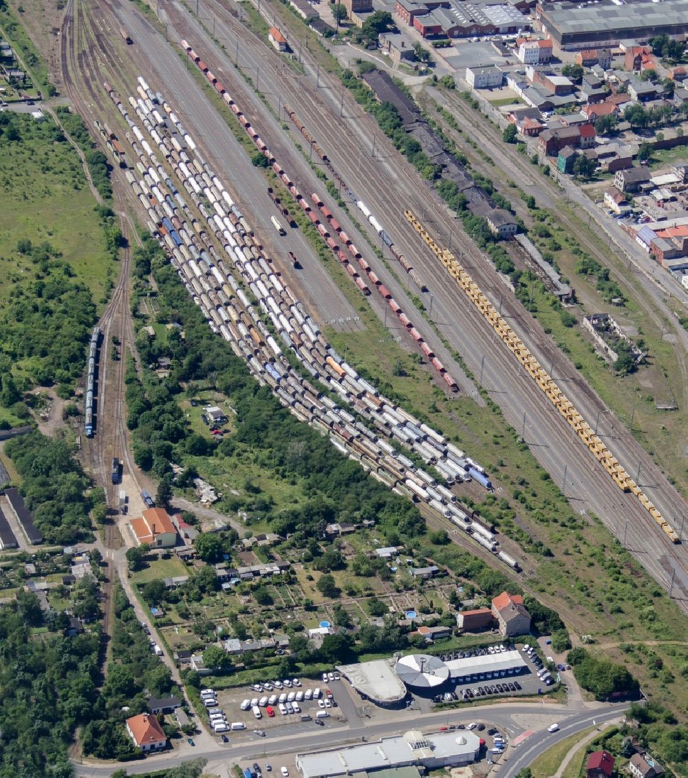 Nordhausen from above - The goods station of Nordhausen in Thuringia is an important transportation hub. On the tracks, many cars are many with tanks, timber and bulk