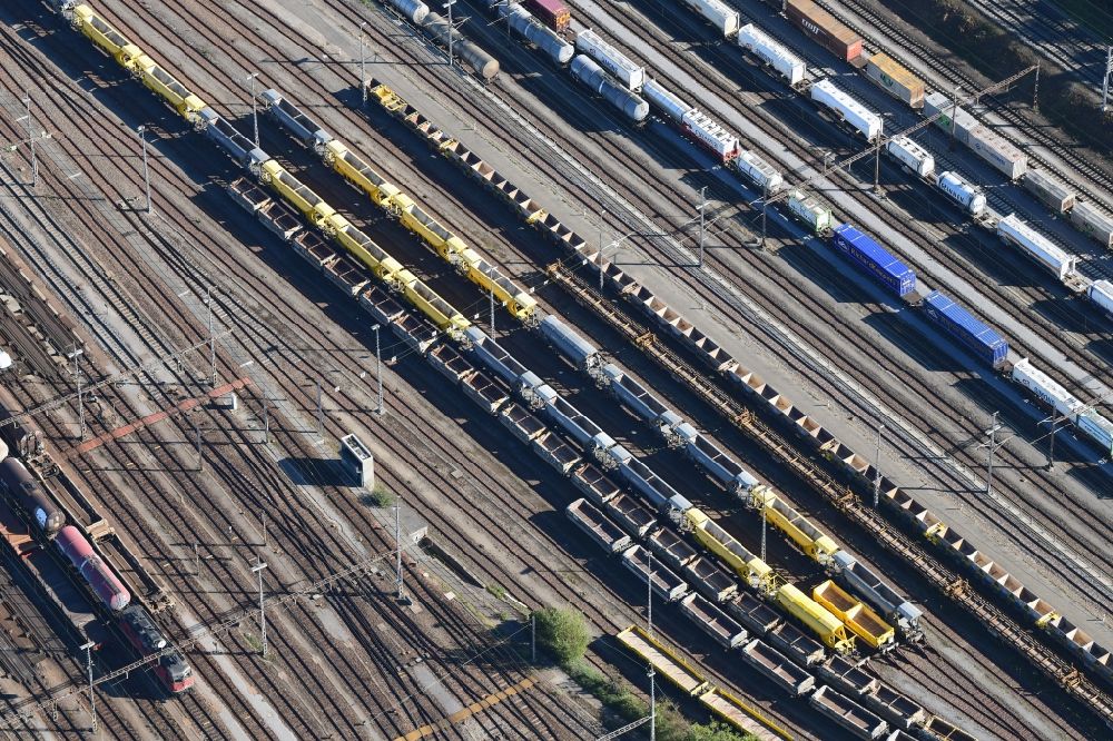 Muttenz from the bird's eye view: Railway tracks and cargo trains in the route network of the Swiss Railway SBB in Muttenz in the canton Basel-Landschaft, Switzerland