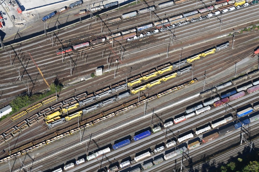 Aerial image Muttenz - Railway tracks and cargo trains in the route network of the Swiss Railway SBB in Muttenz in the canton Basel-Landschaft, Switzerland