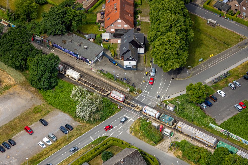 Aerial photograph Sythen - Freight train journey on the track on Bahnuebergang Stockwieser Damm in Sythen in the state North Rhine-Westphalia, Germany