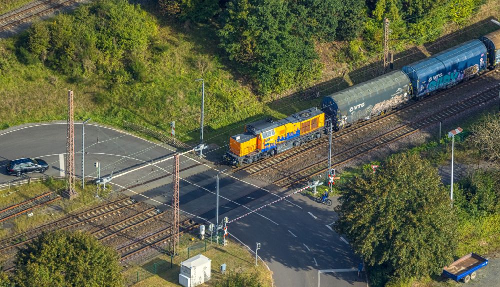 Aerial image Buschhütten - Freight train journey on the track in Buschhuetten at Siegerland in the state North Rhine-Westphalia, Germany