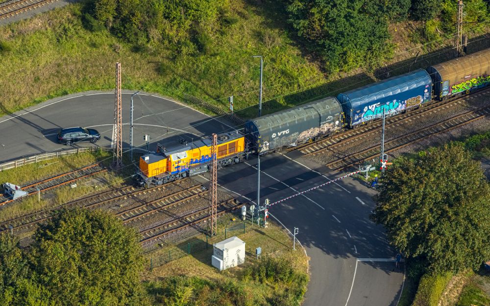 Buschhütten from above - Freight train journey on the track in Buschhuetten at Siegerland in the state North Rhine-Westphalia, Germany