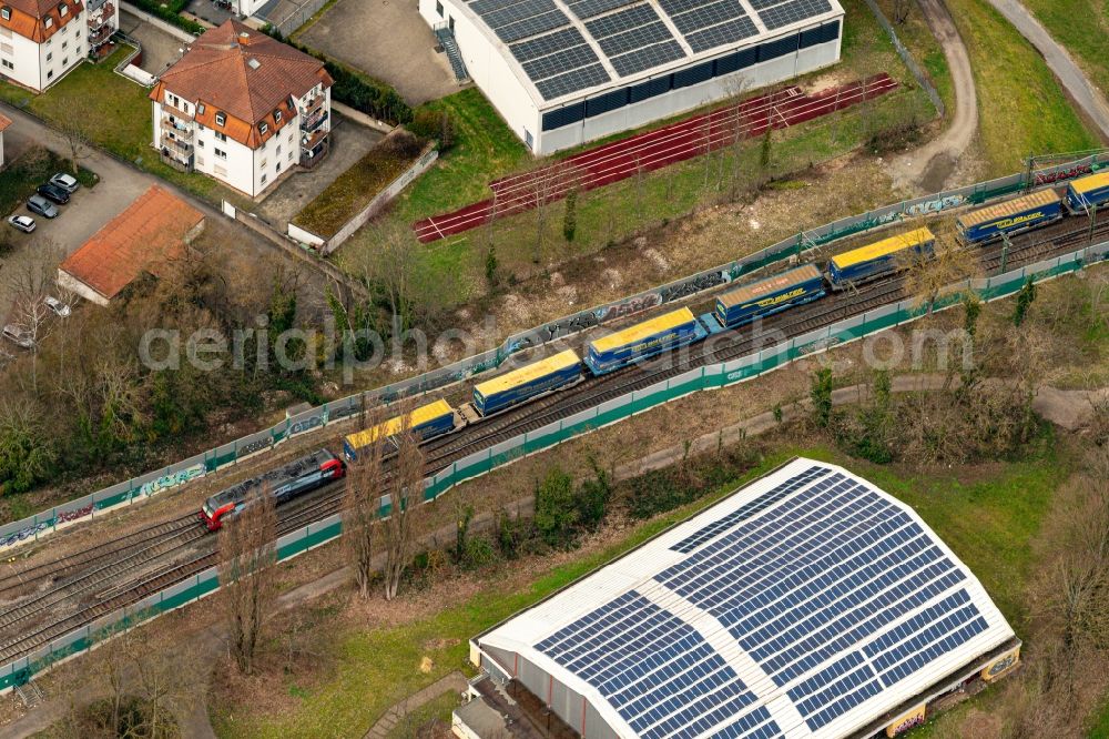 Aerial photograph Rastatt - Freight train journey on the track Rheintal in Rastatt in the state Baden-Wuerttemberg, Germany