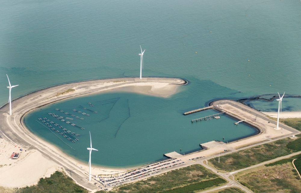 Aerial photograph Oosterschelde - Harbour with a wind power plant on the island Neeltje Jans in the province Zeeland in the Netherlands. On the island runs a part of the Eastern Scheldt storm surge barrier in the estuary of the Oosterschelde