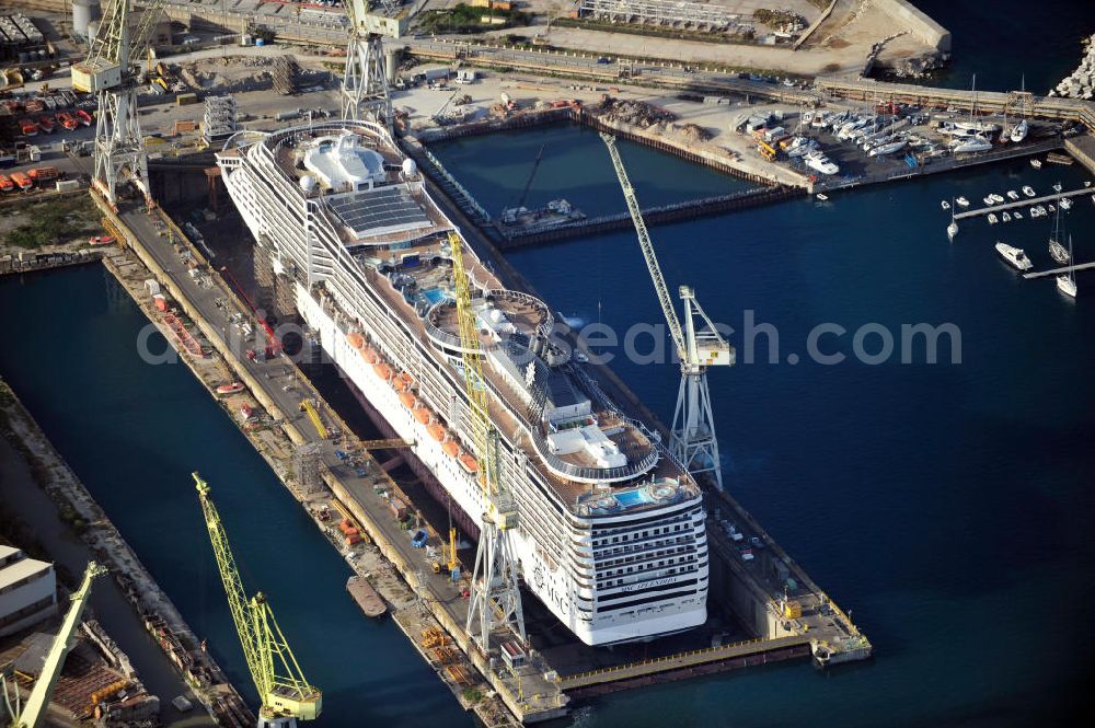 Aerial photograph Palermo Sizilien - Fincantierii yard with the cruise ship MSC Splendida, of the Italian shipping company MSC Crociers S.A. for the overhaul at the dry dock of the shipyard in Palermo, Sicily, Italy