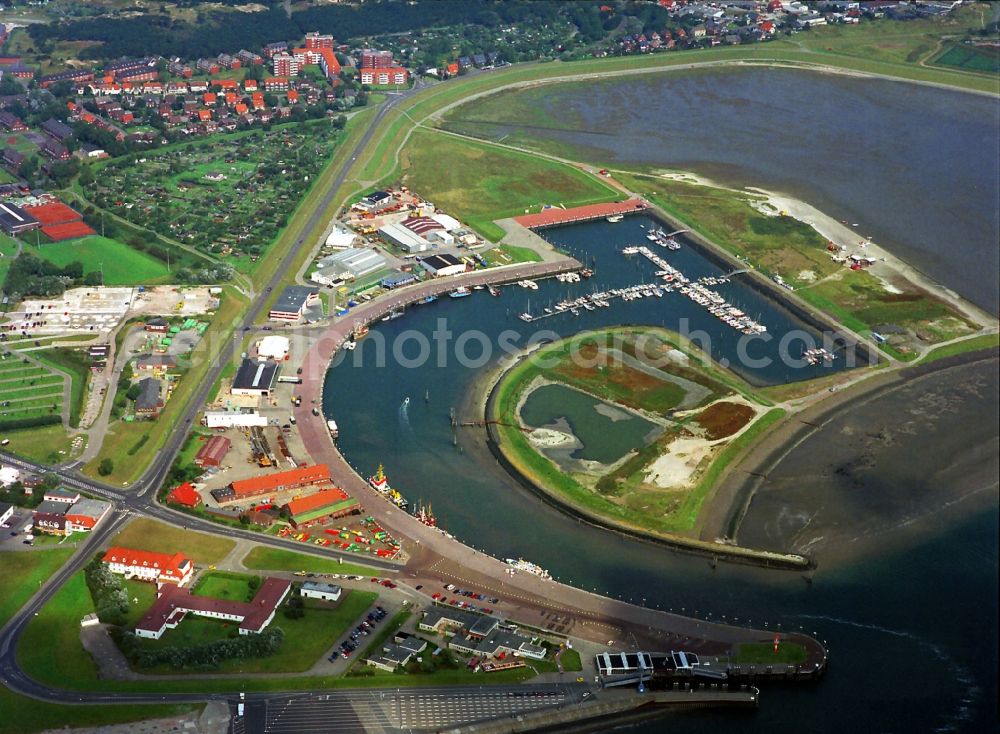 Aerial image Norderney - View of the harbor of the second largest East Frisian Island Norderney in the state Lower Saxony. Part of the island and the surrounding mudflat is part of the national park Wadden Sea of Lower Saxony. As a bathing resort with the therapeutic spa in the city of Norderney, the island is a popular destination for tourists