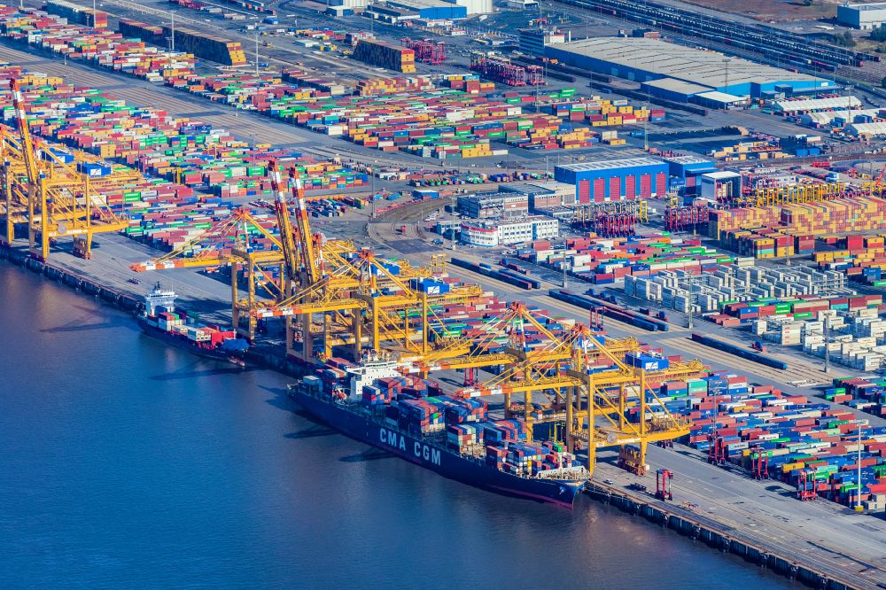 Bremerhaven from above - Docks and terminals with warehouses and freight forwarding and logistics companies by the mouth of the Weser in Bremerhaven in the state Bremen