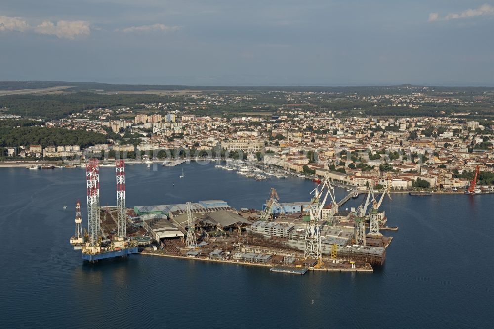 Pula from above - Port facilities on the seashore of the Adriatic Sea in Pula in Istria - Istarska zupanija, Croatia