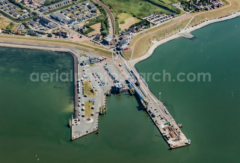 Aerial photograph Dagebüll - Harbour arrangements in the sea coast of north frieze country in Dagebuell in the federal state Schleswig-Holstein, Germany
