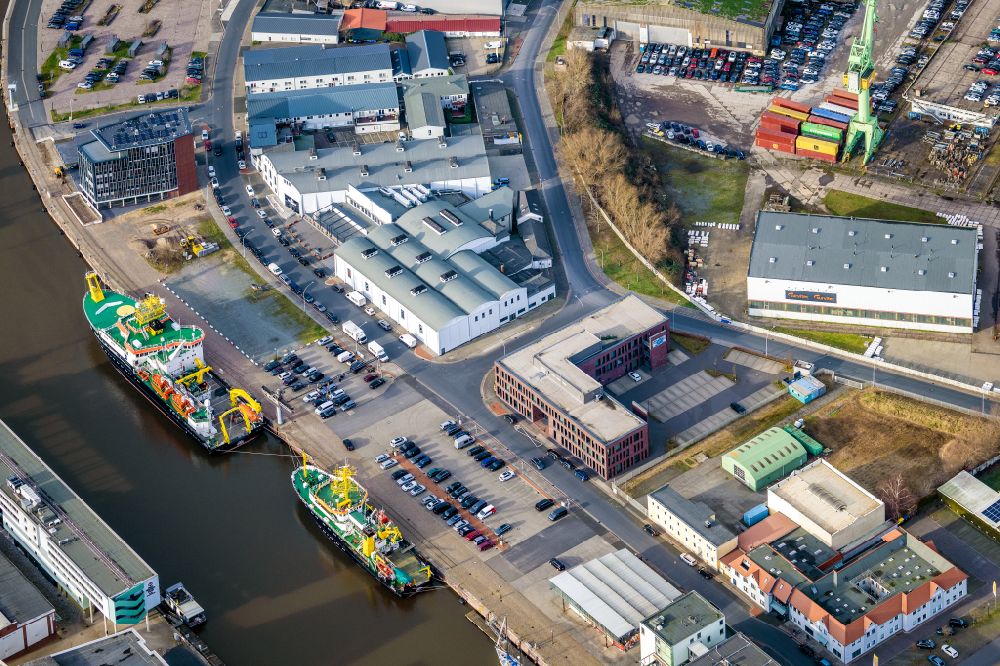 Bremerhaven from above - Docks and terminals of the fishing port with warehouses and freight forwarding and logistics companies by the mouth of the Weser in Bremerhaven in the state Bremen