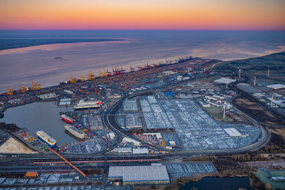 Bremerhaven from the bird's eye view: Docks and terminals with warehouses, freight forwarding and logistics companies and lots of containers by the mouth of the Weser in Bremerhaven in the state Bremen