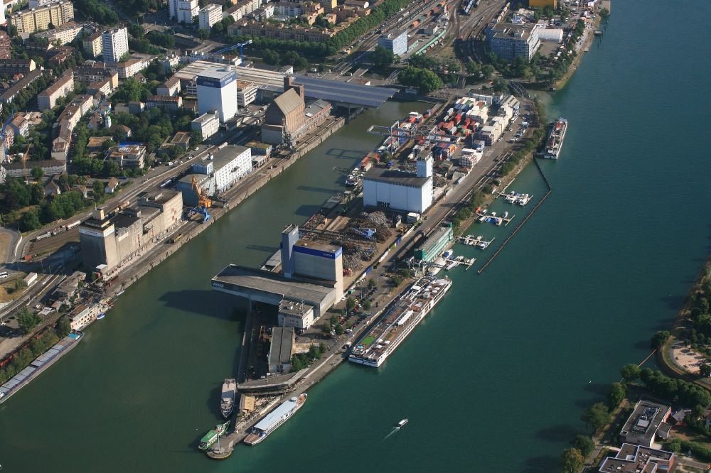 Basel from above - Port facilities on the shores of the harbor at the river Rhine in Basle, Switzerland at the border to Weil am Rhein, Germany and Huningue, France