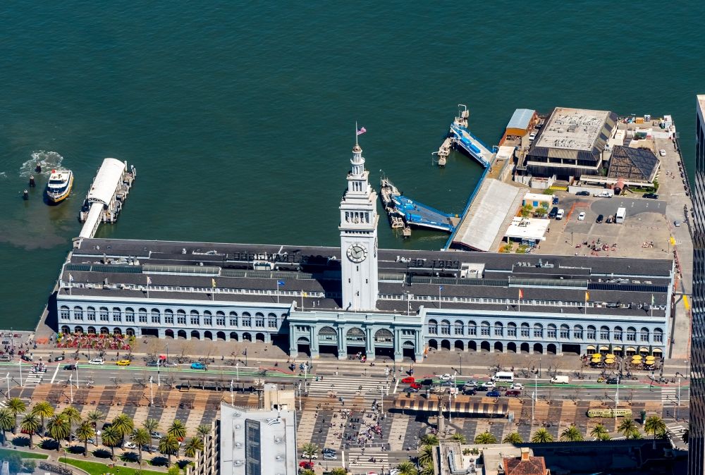 San Francisco from the bird's eye view: Port facilities and white clock tower on the shores of the harbor of des Ferry Terminal in San Francisco in USA