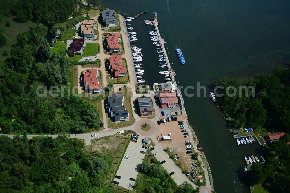 Aerial photograph Plau am See - Pleasure boat marina with docks and moorings on the shore area of Plauer See in Plau am See in the state Mecklenburg - Western Pomerania