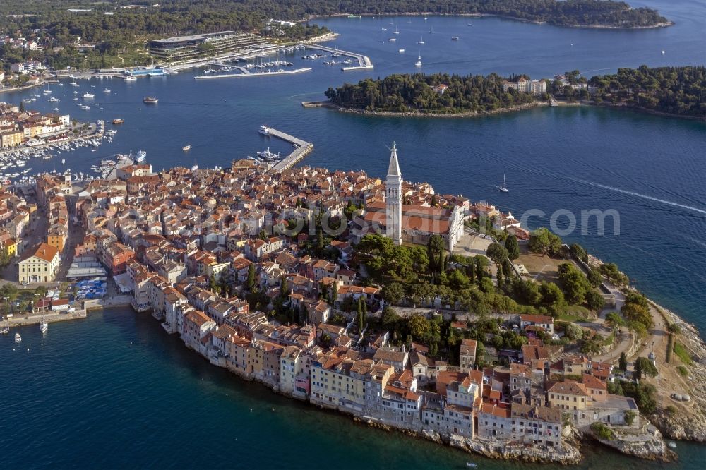 Rovinj from the bird's eye view: Peninsula with land access and shore area on the Adriatischen Meer in Rovinj in Istirien - Istarska zupanija, Croatia
