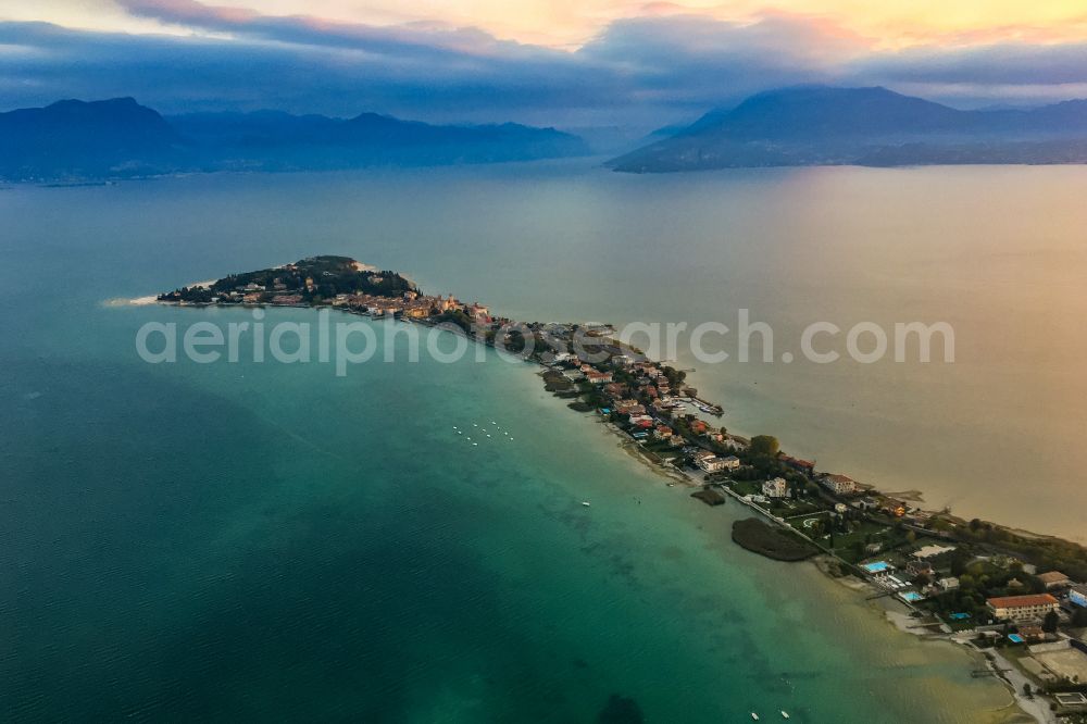 Aerial photograph Sirmione - Peninsula Sirmione with land access and shore area on the Gardasee in Morgenlicht in Sirmione in the Lombardy, Italy