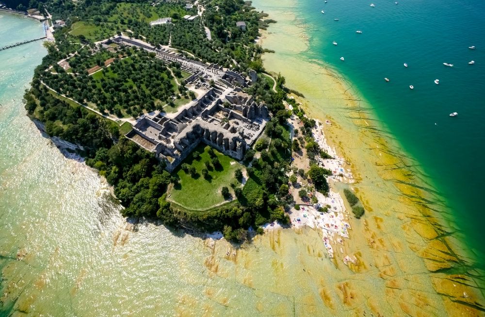 Sirmione from above - Headland Sirmione at the Garda See in Lombardia, Italy. In the picture the ruins of a roman villa - area archeologica delle Grotte di Catullo