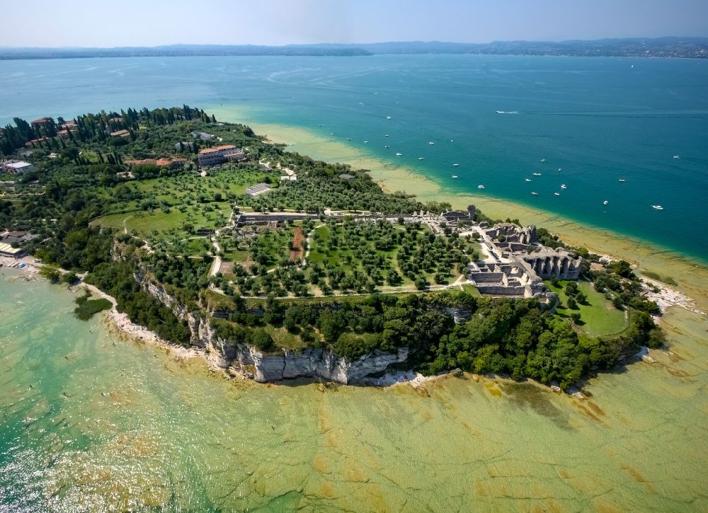 Sirmione from the bird's eye view: Headland Sirmione at the Garda See in Lombardia, Italy. In the picture the ruins of a roman villa - area archeologica delle Grotte di Catullo