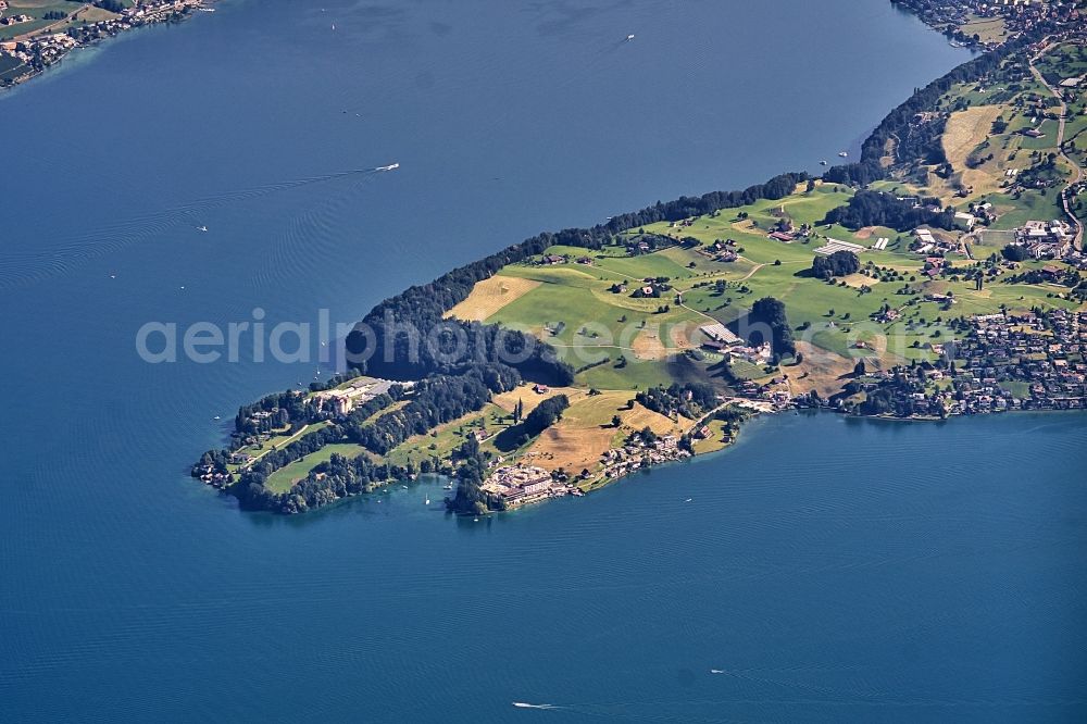 Weggis from the bird's eye view: Peninsula with land access and shore area on the Vierwaldstaetter See in Weggis in the canton Luzern, Switzerland