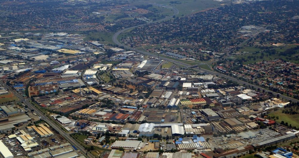 Germiston from the bird's eye view: Industrial and commercial area in the area of Johannesburg in the district Wadeville in Germiston in Gauteng, South Africa