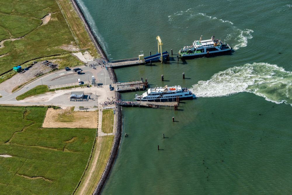 Aerial image Hooge - Hallig Hooge port facility with passenger ship Adler Express and Hilligenlei ferry when docking in the state of Schleswig-Holstein, Germany
