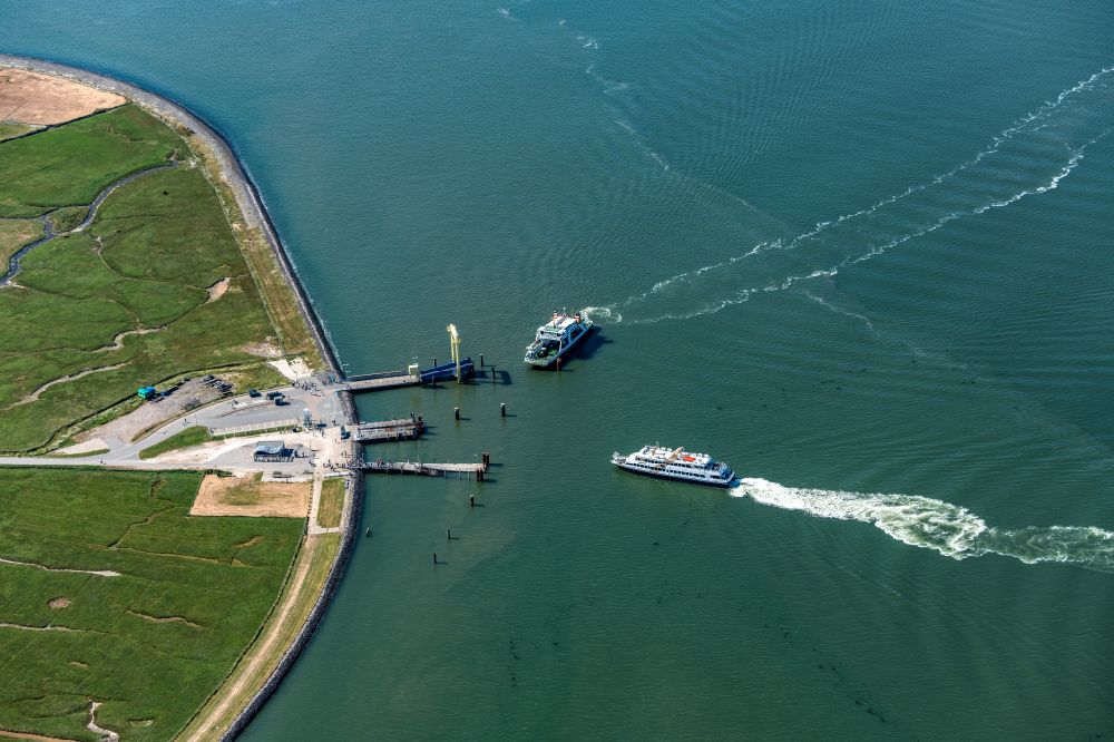 Hooge from above - Hallig Hooge port facility with passenger ship Adler Express and Hilligenlei ferry when docking in the state of Schleswig-Holstein, Germany