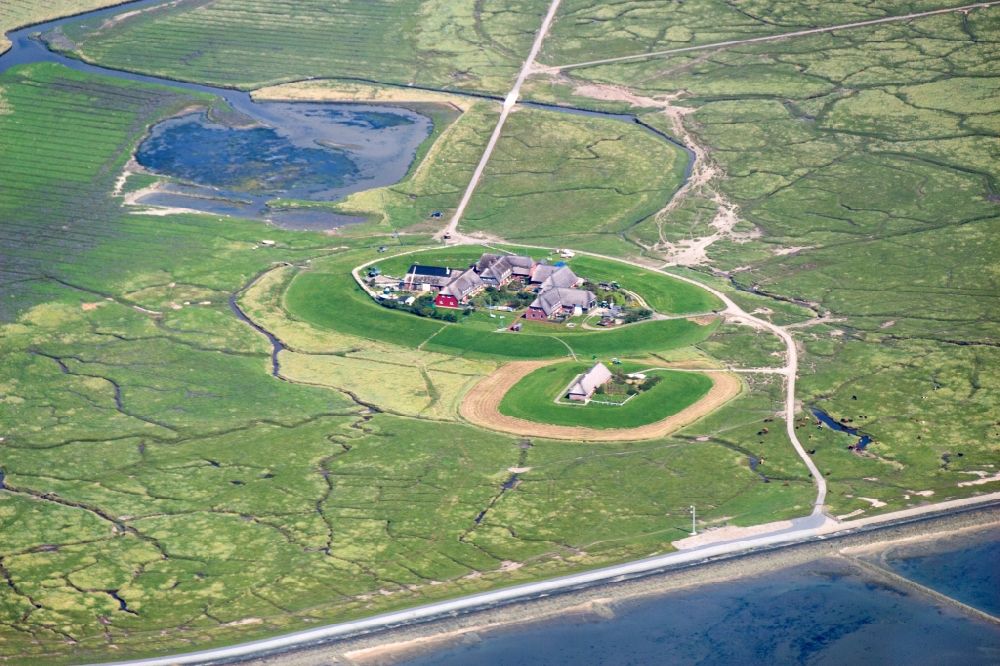 Hooge from the bird's eye view: Hooge is the second largest of the ten halligen in the Wadden Sea, after Langeness. It is frequently called the Queen of the Halligen. The houses on the island are built on ten terpen, in german so called Warften