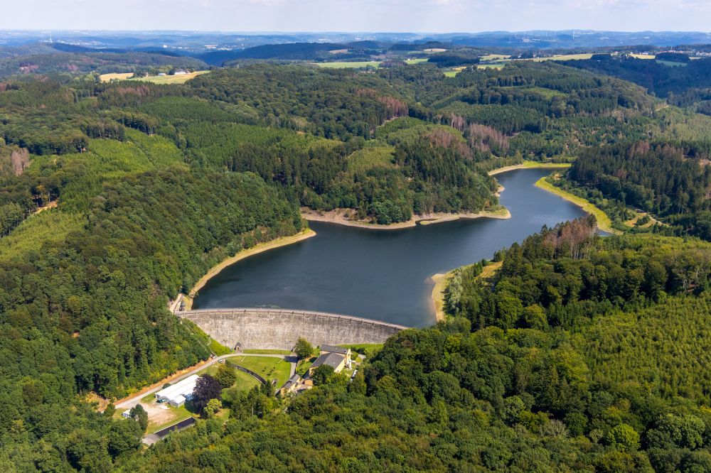Hagen from the bird's eye view: Hasper dam surrounded by autumnal forest areas in Hagen at Ennepetal in North Rhine-Westphalia