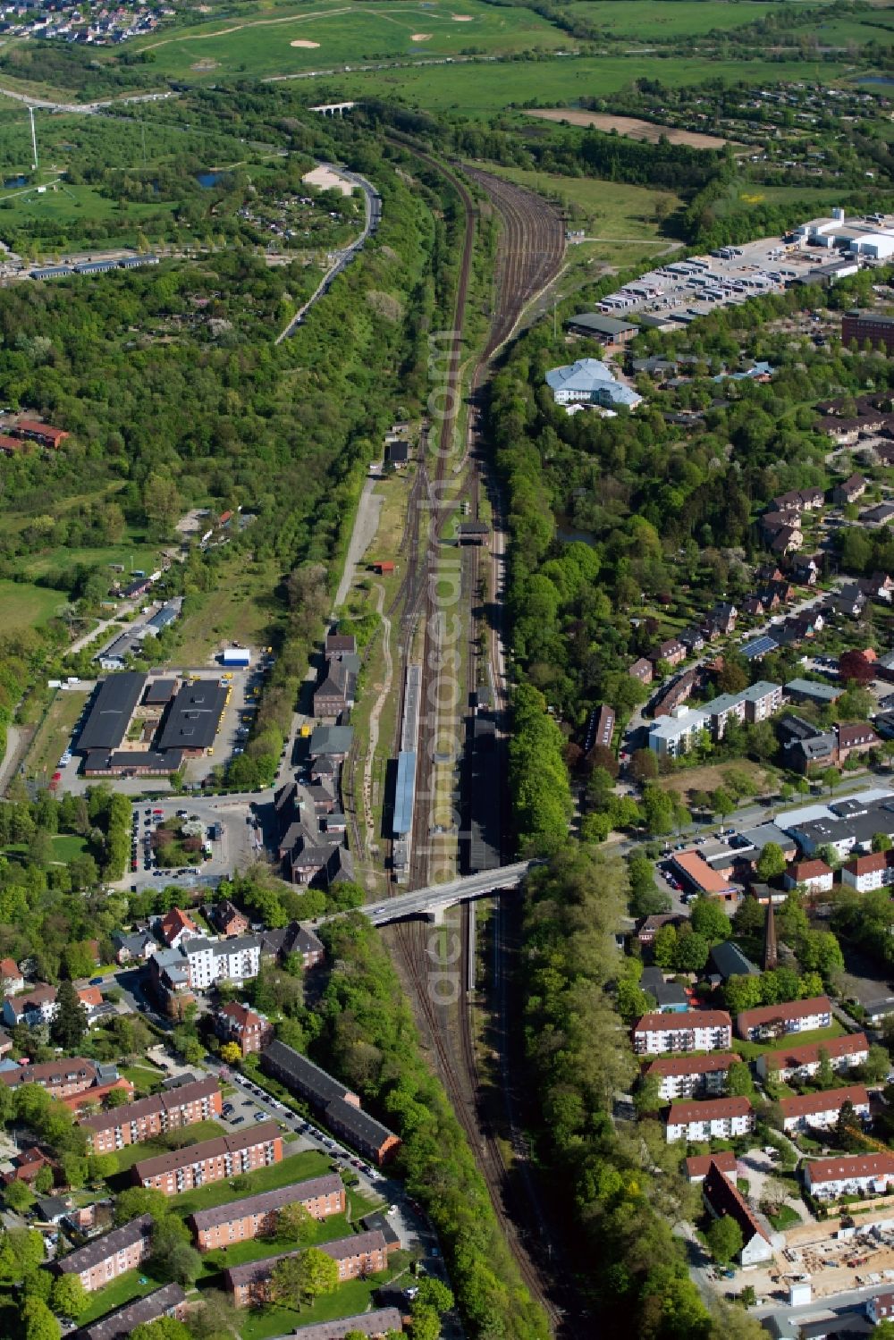 Flensburg from the bird's eye view: Rail course and building of the central station in Flensburg in the federal state Schleswig-Holstein, Germany