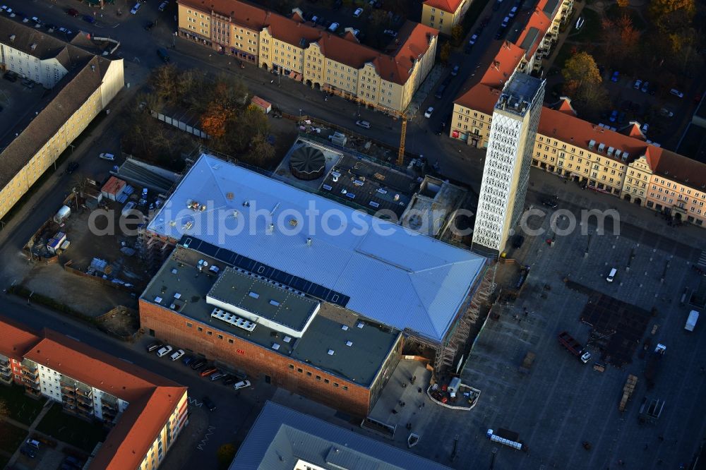 Aerial image Neubrandenburg - Building Haus der Kultur und Bildung HKB with associated office tower. The building is under renovation. In addition to the retail space is located a store of H & M Fashion chain. In Neubrandenburg in Mecklenburg-Vorpommern